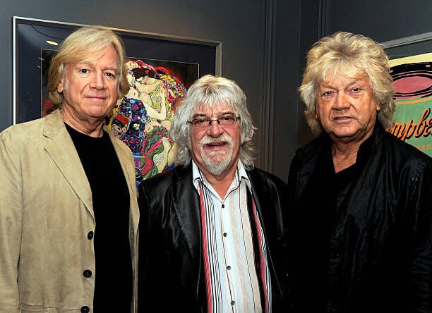 LOS ANGELES, CA - NOVEMBER 01:  (L-R) Musicians Justin Hayward, Graeme Edge and John Lodge of the Moody Blues pose backstage before performing at the Nokia Theatre on November 1, 2013 in Los Angeles, California.  (Photo by Kevin Winter/Getty Images)