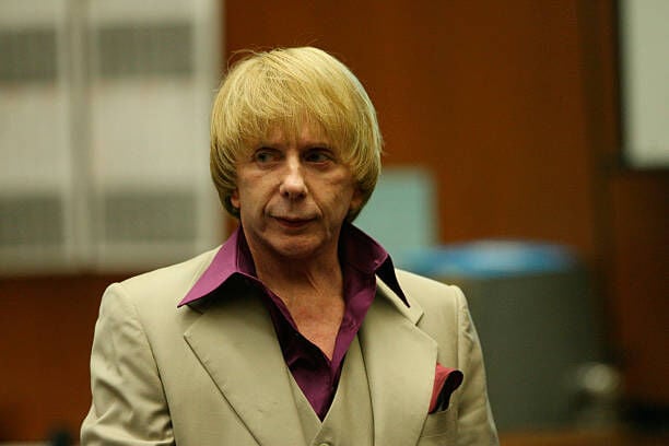 LOS ANGELES - APRIL 25:  Music producer Phil Spector (R) leaves the courtroom during a break with his lead attorney Bruce Cutler (L) at Los Angeles Superior Court April 25, 2007 in Los Angeles, California. Spector is accused of the murder of actress Lana Clarkson who was found shot dead in Spector?s home February 3, 2003.  (Photo by Gabriel Bouys-Pool/Getty Images)